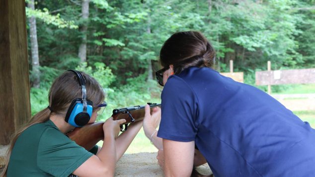 Camper and Instructor at Rifle Range
