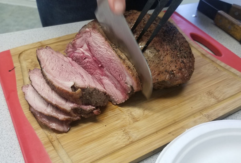 Carving roasted lamb