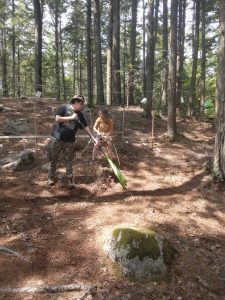 Youth cleaning up at a YMCA Camp
