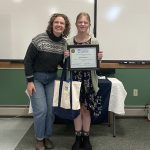 Lexi receiving the 4-H Leadership in Action Award with Leah, 4-H staff