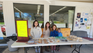 4-H youth outside a store selling baked goods