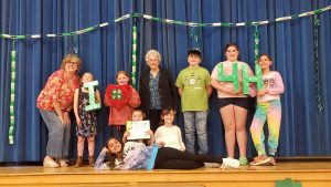 Jolly Juniors Style Revue Participants with their club leader, Brenda, and a long time 4-H volunteer, Norma.
