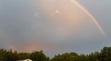 4-H Exhibit Hall under a beautiful rainbow during the Blue Hill Fair