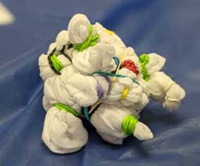 display of process of tie-dying cotton handkerchiefs