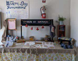 a display table set up showing the work of York County Extension Homemakers