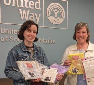 Cathy Gray, UMaine Extension Staff, delivers Janet’s Jammies to the United Way of Southern Maine.