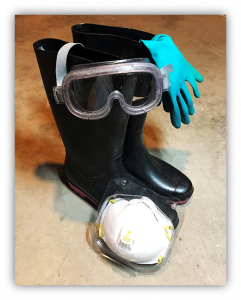 Rubber boots, gloves, goggles, and an N95 filtering face piece respirator.