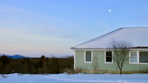 Extension office building with snow and moon