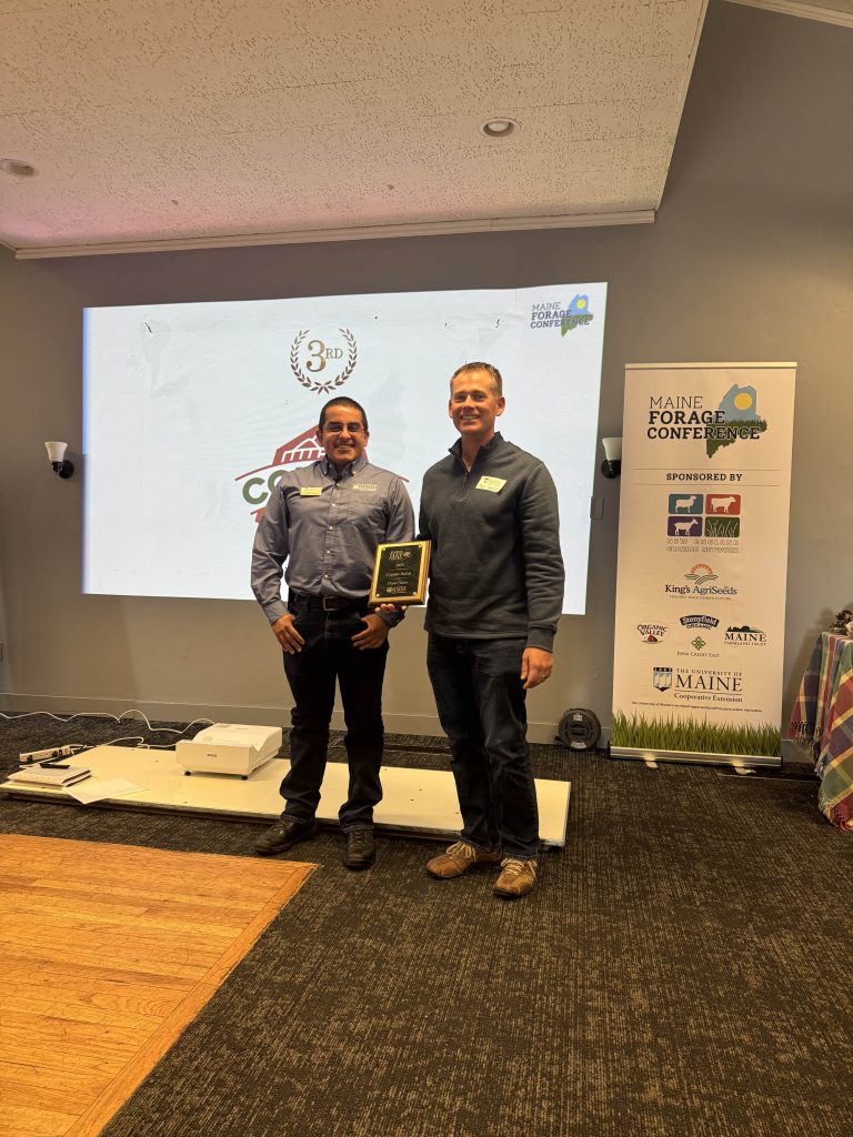 Hardy Farm accepting first place at 2025 Maine Hay Contest