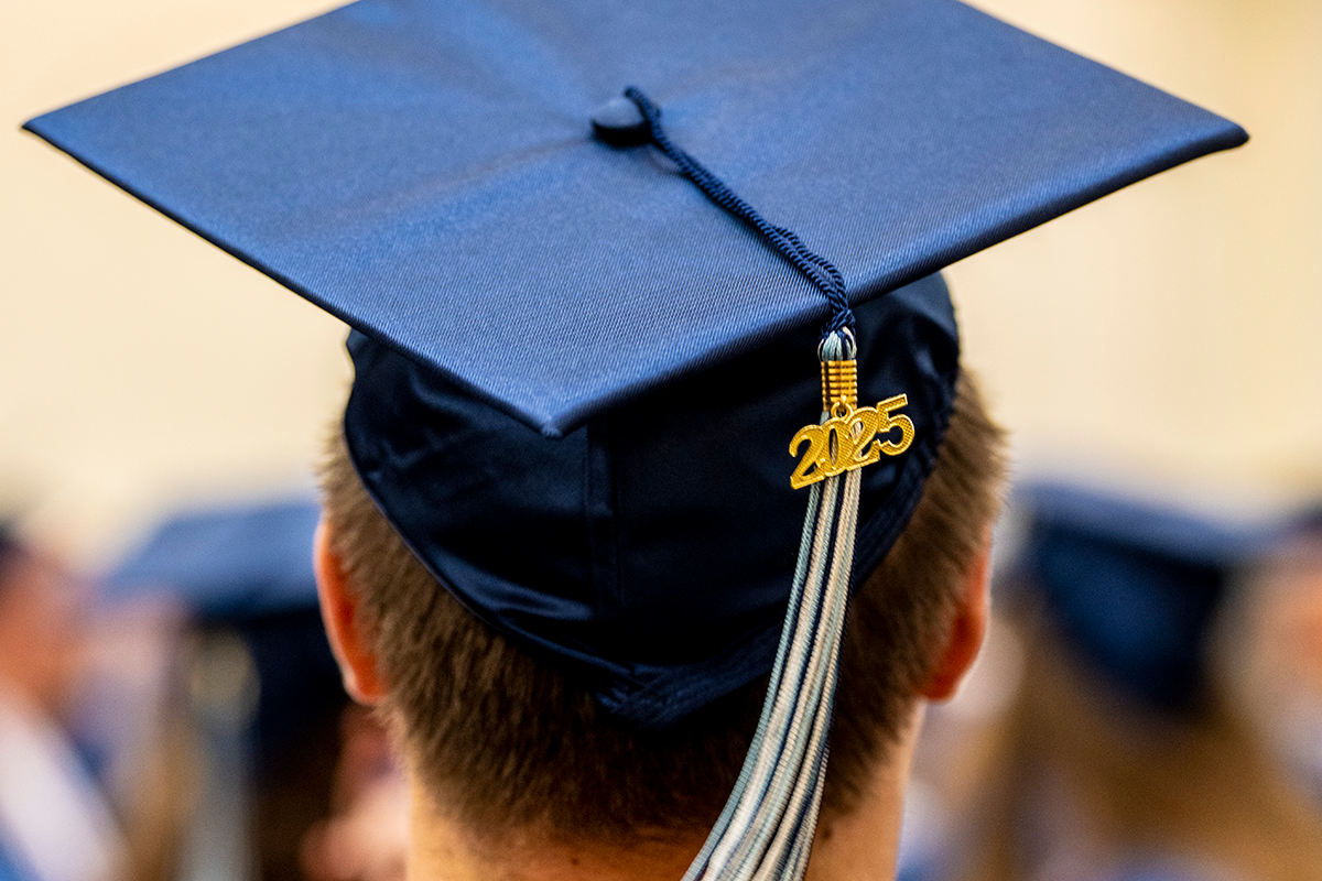a undergrad student wearing a mortarboard at graduation