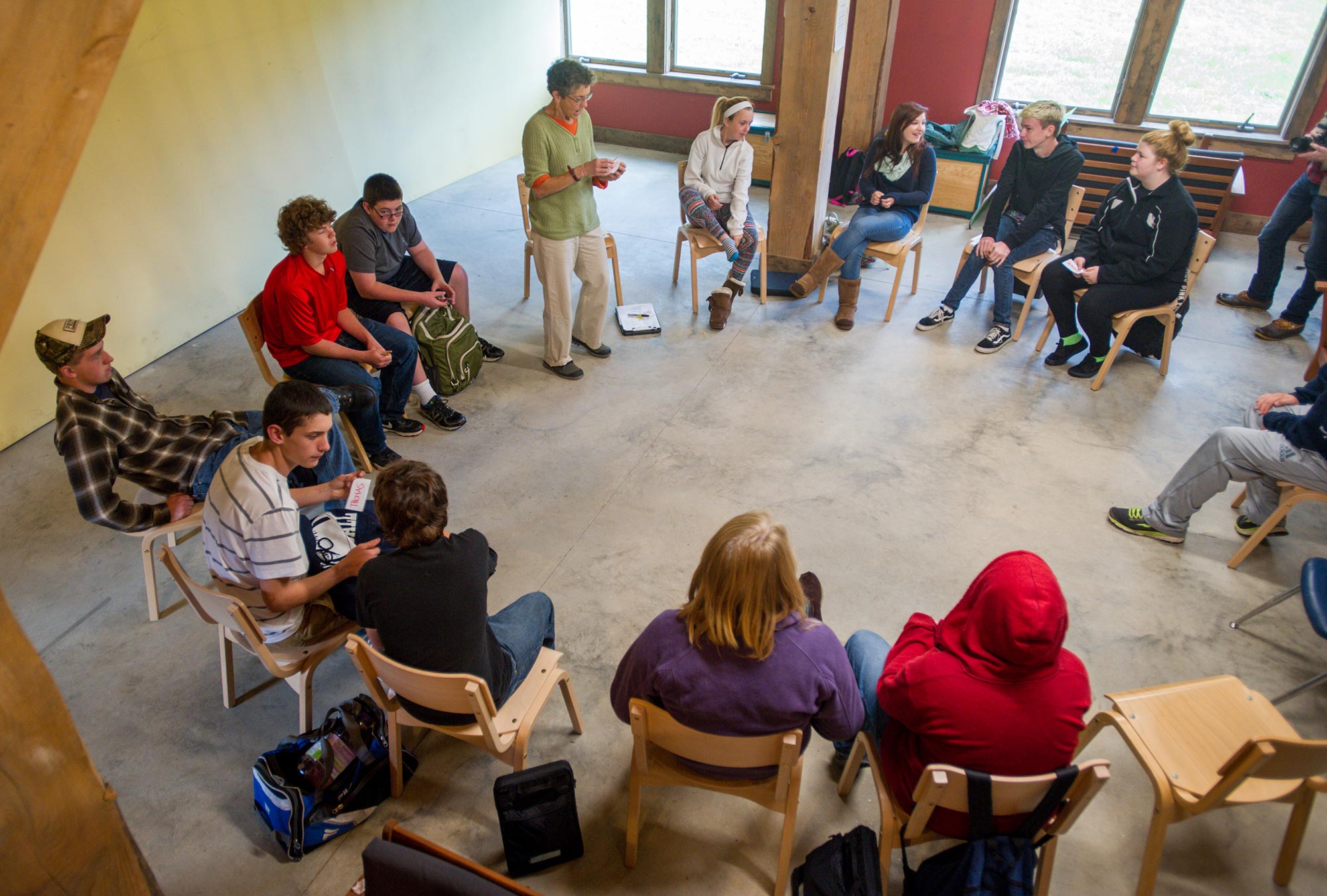 a group meeting in a circle to mediate an issue