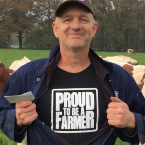 dairy farmer in the Netherlands shows off his 'proud to be a farmer' T-shirt