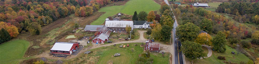 aerial view of a garden, barn and farm