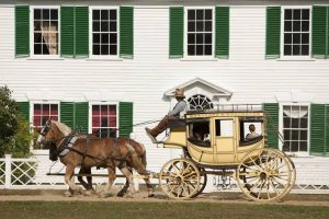 stage coach horse and buggy in front of home
