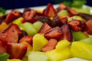 fruit salad with berries, pineapple, melon