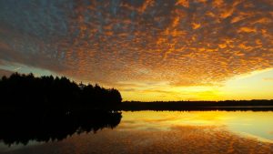 Sunrise view of Big Indian Lake in St. Albans, Maine