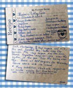 a front and back of a recipe card for blueberry pudding cake with a gingham fabric background