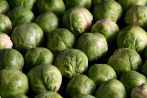 close up of a large amount of brussels sprouts