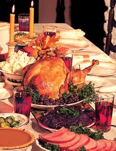 vintage image of a Thanksgiving dinner with turkey and side dishes