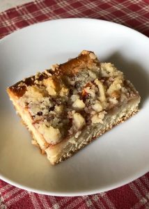 apple cake square with streusel on a plate