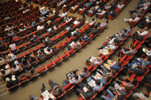 People meeting in an auditorium