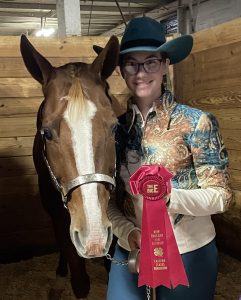 4-H Youth, Samantha B. with her Horse and Ribbon