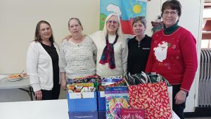 Five Cambridge Homemakers members and their donations