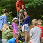 campers create a "ski jump" during a STEM activity