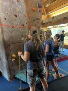 Learning about belaying at Maine Bound