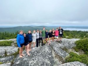 Hikers on granite bald