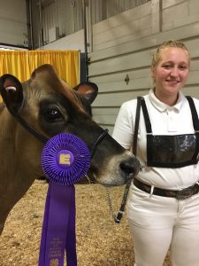 4-H member with her cow