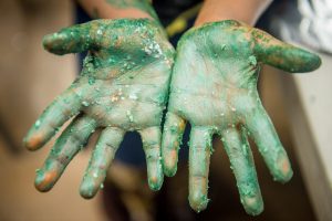 4-H'er's hands covered with soap from an STEM experiment
