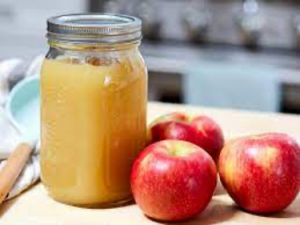 Apples and a jar of applesauce