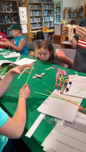 Participants in the Princeton area became engineers and built a wind powered vehicle. The goal of the activity was to see how far the vehicle would travel blowing on it once.