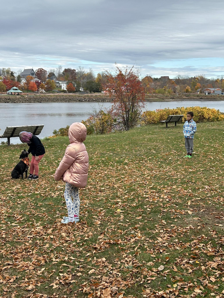 youth at the park with dog