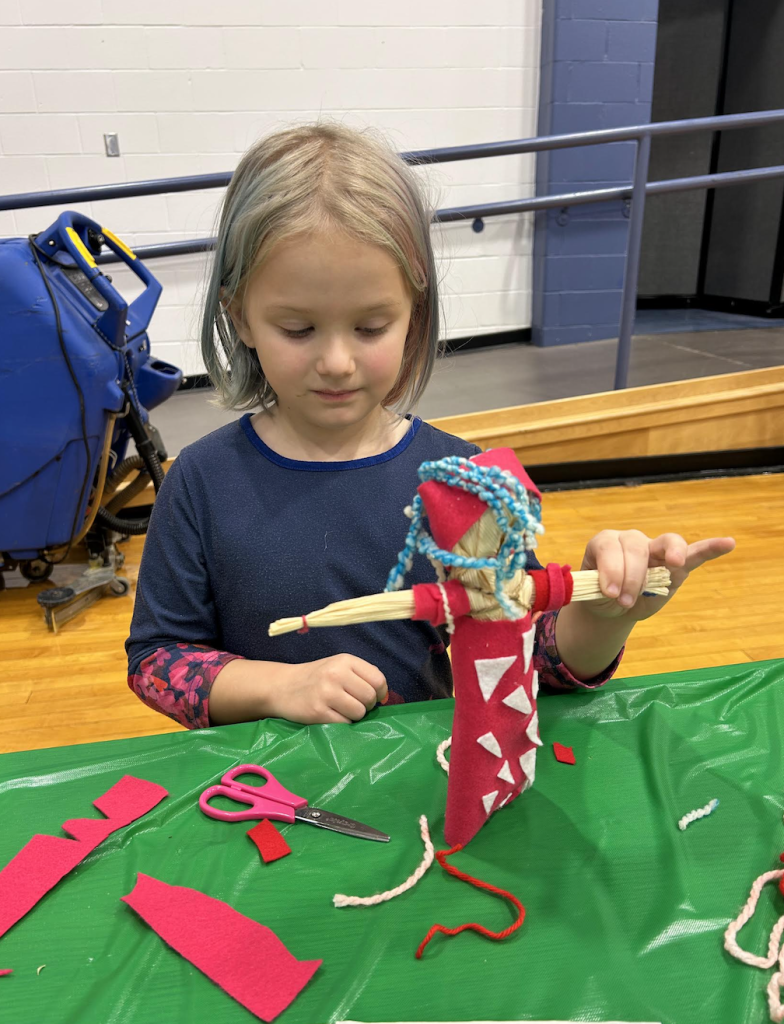 youth making a doll