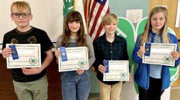 Members of the Cobscook Currents 4-H club who recently participated in county and state public speaking tournaments were, left to right, Soren D., Ruth B., Theo M., and Ira D. All four youth earned blue ribbons at the county tournament.