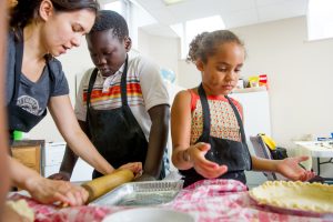 4-H youth making pie crust