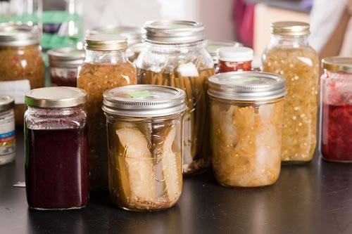 jars of preserved produce: fruits and vegetables