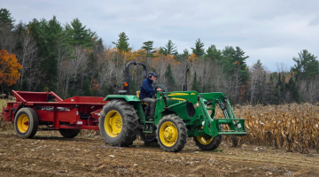 Man driving a tractor.