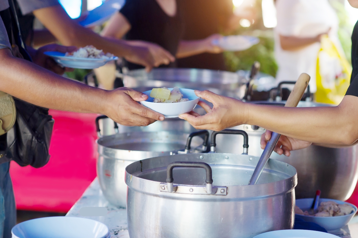 Scoop buffet food at a restaurant catering food