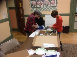 Wall-E 4-H Club members working on a robotics project