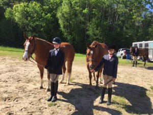 Boots and Buckles 4-H Club members pose with their horses