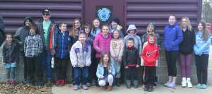 Nature Kids 4-H Members group standing with EMTS 